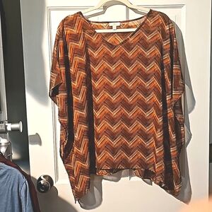 Batwing flowy semi-sheer top